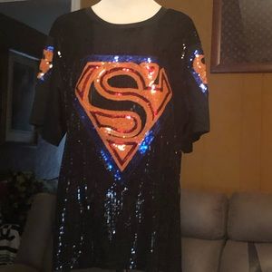 Sequin black top w/ orange Superman logo on front with side slits Plain on back